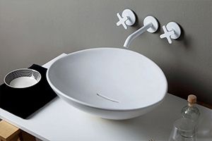 Умивальники зі штучного каменю: вибір для сучасної ванної кімнати фото