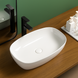 Керамічний умивальник BEVEL-0105 білий в інтерʼєрі